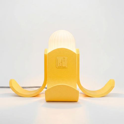 luminaria amarelo alaranjado romulo temigue acesa