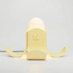 luminaria-banana-romulo-temigue-frente-acesa